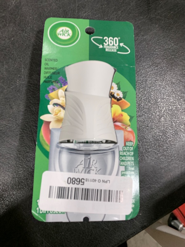 Photo 1 of Air Wick plug in Scented Oil Warmer, White, 1 Count, Essential Oils, Air Freshener