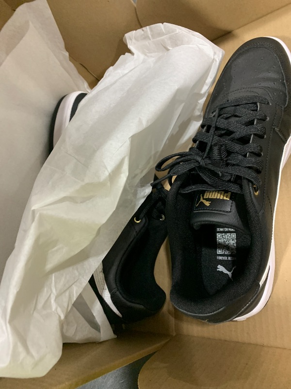 Photo 1 of PUMA Men's Caven 2.0 Sneaker Black White-Gold, 12