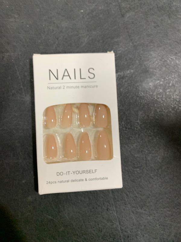 Photo 1 of YOSOMK Nude Press on Nails Almond Shaped Fake Nails Medium Glossy Stick on Nail Natural Full Cover False Nail Acrylic Glue on Nails for Women