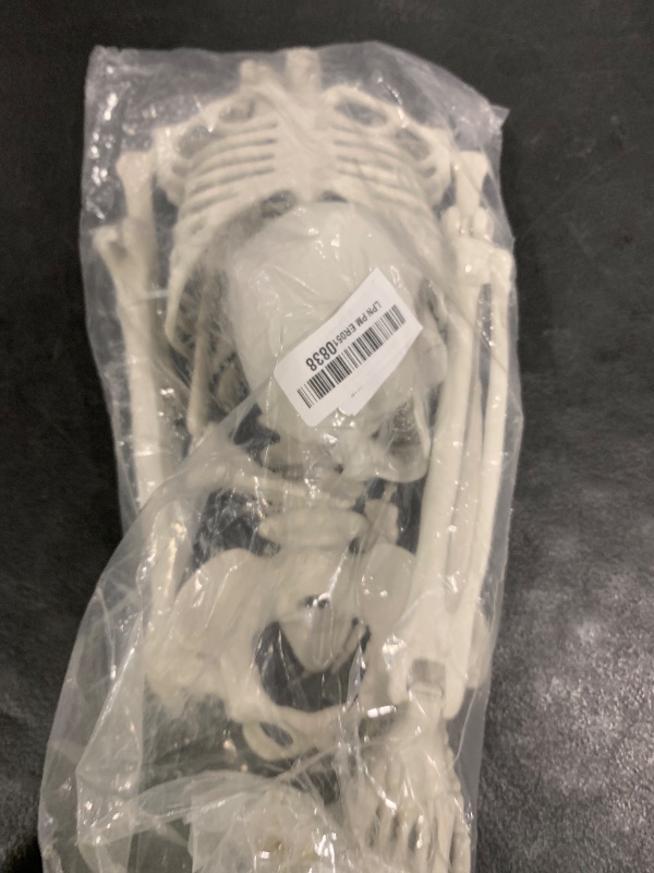 Photo 1 of 36" Skeleton Halloween Decor, 3FT Posable Halloween Skeleton Decorations, Realistic Full Body Plastic Skeleton for Halloween Party Decor, Haunted House Graveyard Props Indoor Outdoor Decorations