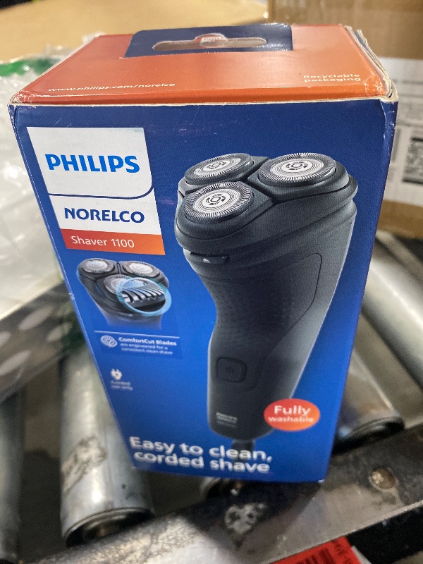 Photo 1 of Philips Norelco Shaver 1100 Series, Dry Electric Shaver, 27 Self-Sharpening ComfortCut Blades, 4D Floating Heads, P-Cap, Deep Black, Model S1016/90