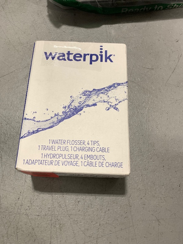 Photo 1 of Waterpik Cordless Slide Professional Water Flosser, Portable Collapsible for Travel and Storage, with Travel Bag and 4 Tips, ADA Accepted, Rechargeable and Waterproof, Modern Gray WF-17CD017-1