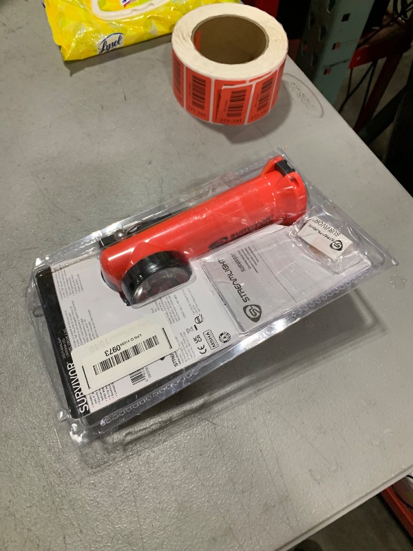 Photo 1 of Streamlight 90540 Survivor 175-Lumen Alkaline Safety-Rated Firefighter Right Angle Flashlight, Orange