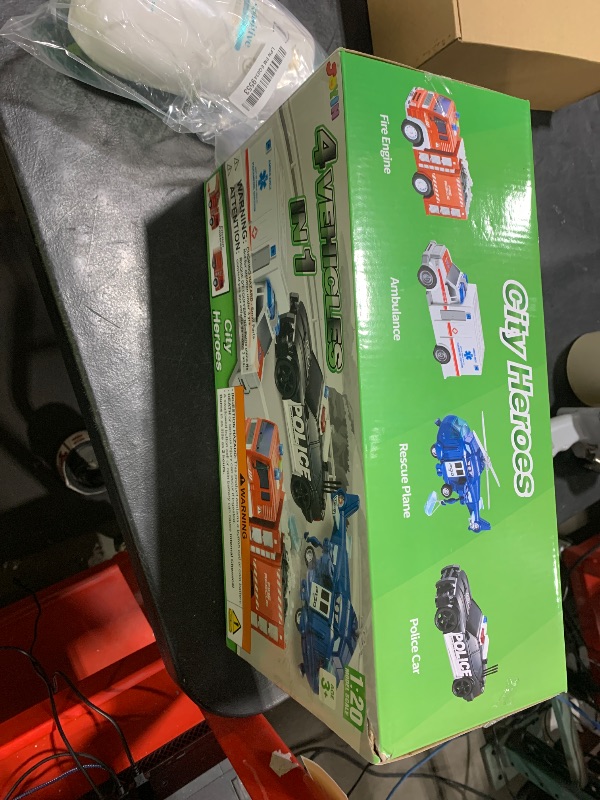 Photo 1 of JOYIN 4 Packs Emergency Vehicle Toy Playsets, Friction Powered Vehicles with Light and Sound, Including Fire Truck, Ambulance, Play Police Car and Helicopter, Christmas Toddler Kids Boys Gifts