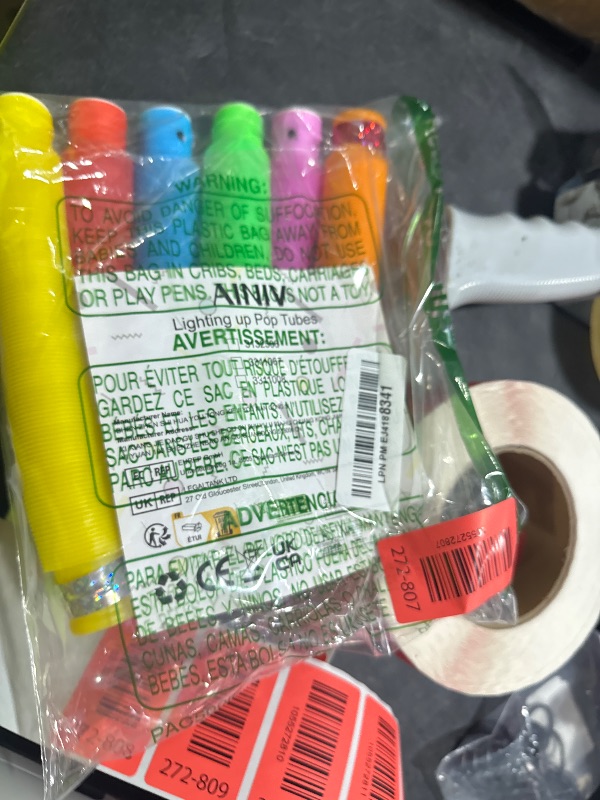 Photo 1 of Ainiv LED Light Up Pop Tubes Fidget Toys for Kids Sensory Toys, 6 Pack LED Pop Fidget Tubes Glow in The Dark Party Favors Supplies Toddler Sensory Toys Stocking Stuffers Return Gifts Prize