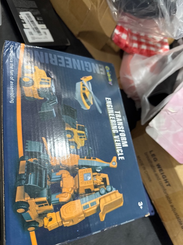 Photo 1 of Gzsbaby Transforming Robot Toys Set for Boys, 6 in 1 Magnetic Construction Trucks Transform Robot Play Vehicles with Storage Box (Construction Toys)