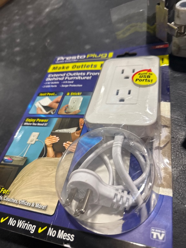 Photo 1 of Ontel Presto Plug Outlet Extender for Relocating Unreachable Power Outlets, 4ft Cord, Sticks Easily on Wall, Provides Surge Protection, 2 AC Outlets, 2 USB Ports & Built-in Shelf