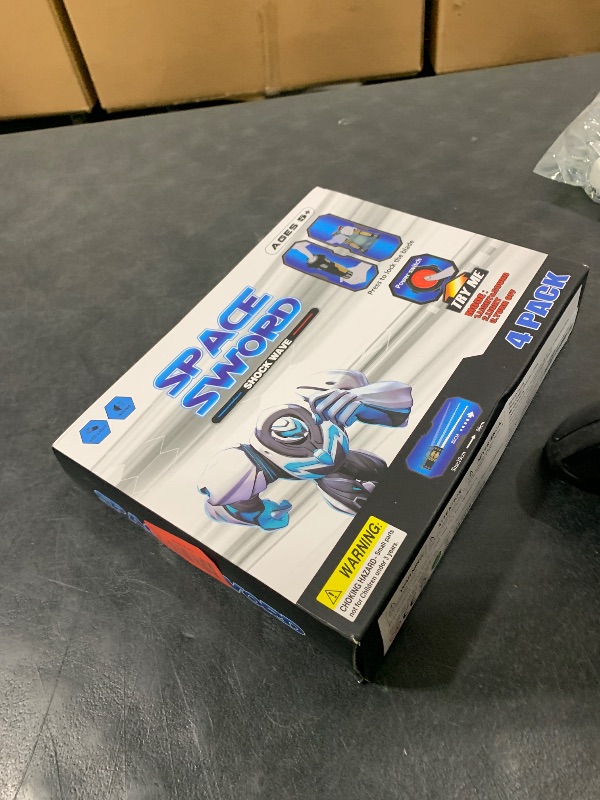 Photo 1 of 4 Pack  Sword Saber with FX Sound (on-Off Control) and Full Retractable Handle, 4 Colors LED Glow in The Dark Toy for Kids Adult