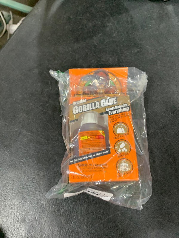 Photo 1 of Gorilla Original Gorilla Glue, Waterproof Polyurethane Glue, 2 Ounce Bottle, Brown, (Pack of 1)