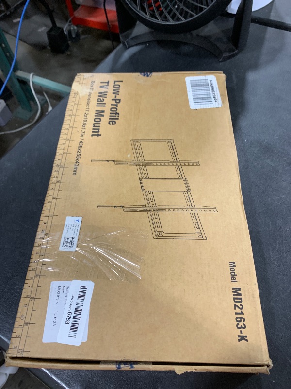 Photo 1 of Mounting Dream TV Mount Fixed for Most 42-84 Inch Flat Screen TVs, TV Wall Mount Bracket up to VESA 600 x 400mm and 132 lbs - Fits 16"/18"/24" Studs - Low Profile and Space Saving MD2163-K