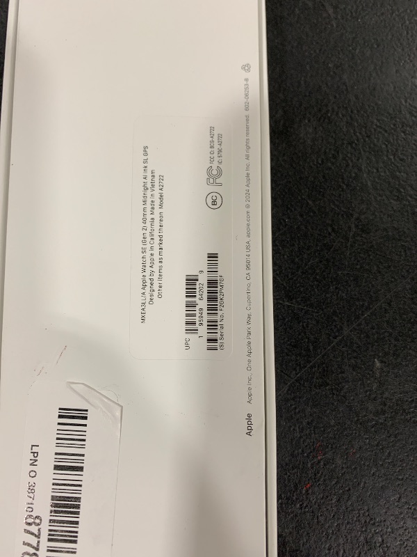 Photo 1 of Apple Watch SE (2nd Gen) [GPS 40mm] Smartwatch with Midnight Aluminum Case with Ink Sport Loop One Size. Fitness and Sleep Trackers, Crash Detection, Heart Rate Monitor, Carbon Neutral