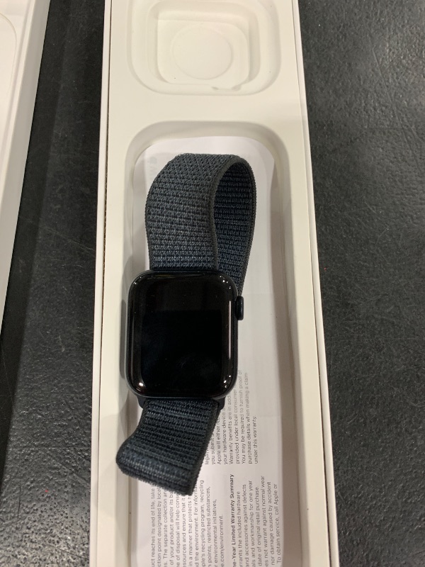 Photo 1 of Apple Watch SE (2nd Gen) [GPS 40mm] Smartwatch with Midnight Aluminum Case with Ink Sport Loop One Size. Fitness and Sleep Trackers, Crash Detection, Heart Rate Monitor, Carbon Neutral
