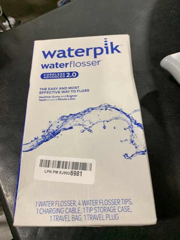 Photo 1 of Waterpik Cordless Advanced 2.0 Water Flosser For Teeth, Gums, Braces, Dental Care With Travel Bag and 4 Tips, ADA Accepted, Rechargeable, Portable, and Waterproof, White WP-580, Packaging May Vary