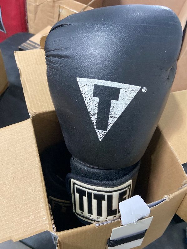 Photo 1 of 2 Boxing Gloves, Pro Training Gloves for Men and Women, Secure Fit Hook and Loop Closure & Ventilation, Heavy Bag & Speedbag Training (14 oz, Black)