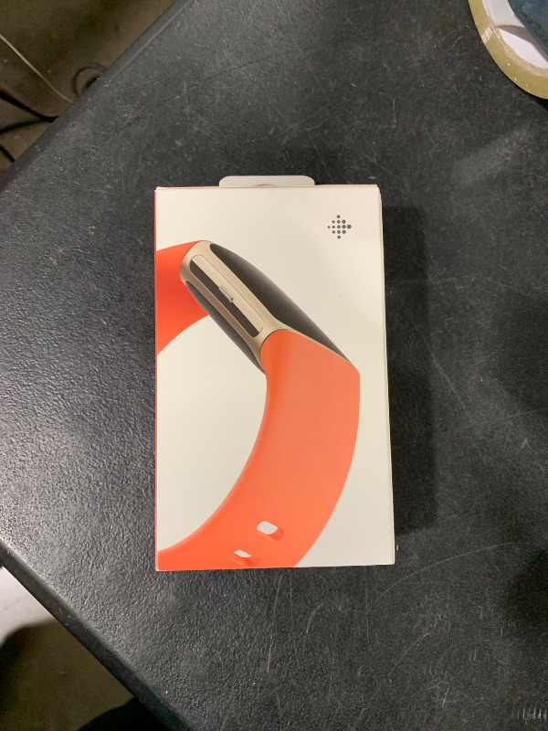 Photo 1 of Fitbit Charge 6 Fitness Tracker with Google apps, Heart Rate on Exercise Equipment, 6-Months Premium Membership Included, GPS, Health Tools and More, Gold/Coral, One Size (S & L Bands Included)