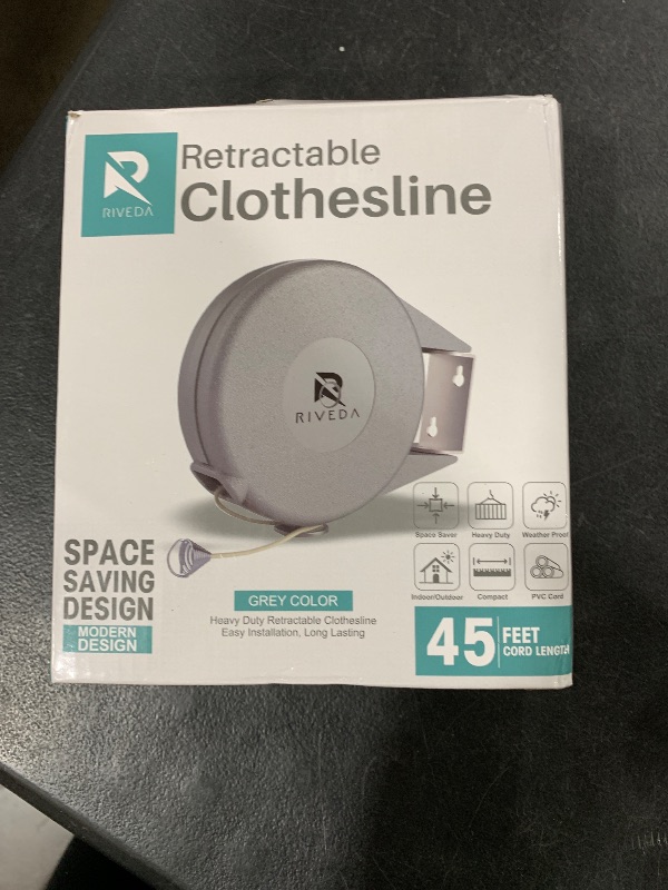 Photo 1 of Retractable Clothesline - Portable Heavy Duty Indoor and Outdoor Washing Line - 45 Feet PVC Retracting Clothes Line with Wall Mount Hang The Wet Dry Clothing Laundry - Easy Installation (Grey)