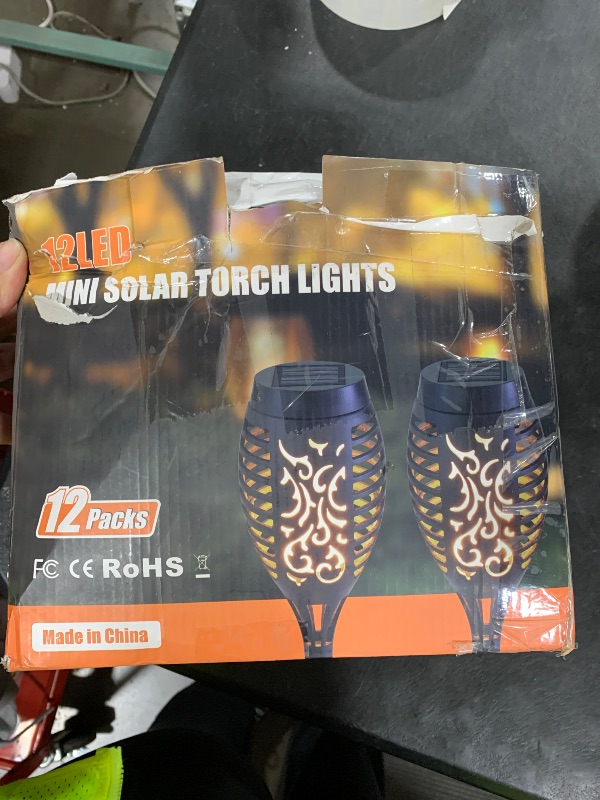 Photo 1 of Otdair Solar Halloween Lights Outdoor Waterproof, 12 Pack 12LED Tiki Torches for Outside with Flickering Flame, IP65 Backyard Lights Outdoor Auto On/Off for Garden, Patio, Yard, Pathway