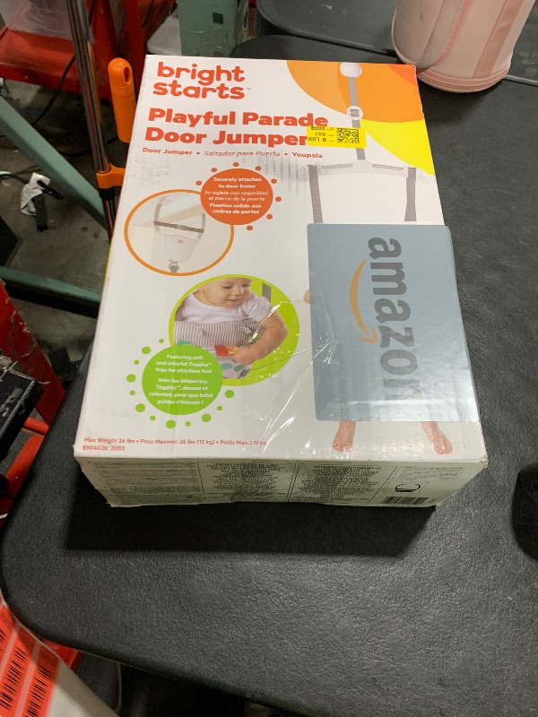 Photo 1 of Bright Starts Playful Parade Door Jumper for Baby with Adjustable Strap, 6 Months and Up, Max Weight 26 lbs