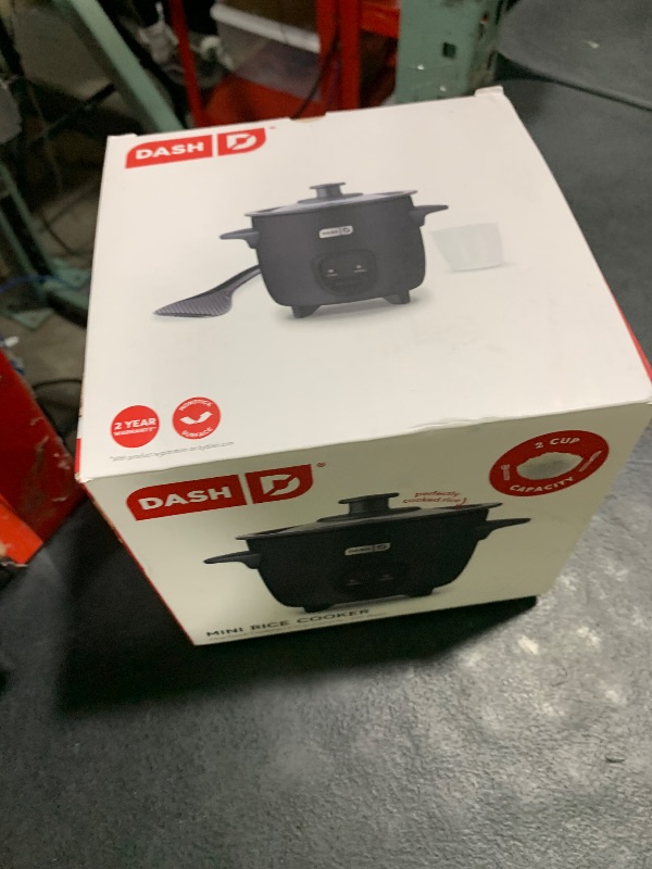 Photo 1 of DASH Mini Rice Cooker Steamer with Removable Nonstick Pot, Keep Warm Function & Recipe Guide, One Half Quart, for Soups, Stews, Grains & Oatmeal - Black