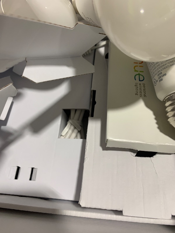 Photo 1 of Philips Hue Smart Light Starter Kit - Includes (1) Bridge and (4) 75W A19 E26 LED Smart White and Color Ambiance Bulbs - Control with App - Compatible with Alexa, Google Assistant, and Apple HomeKit