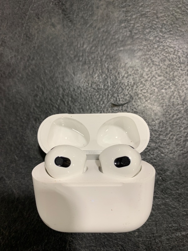 Photo 1 of Apple AirPods (3rd Generation) Wireless Ear Buds, Bluetooth Headphones, Personalized Spatial Audio, Sweat and Water Resistant, Lightning Charging Case Included, Up to 30 Hours of Battery Life