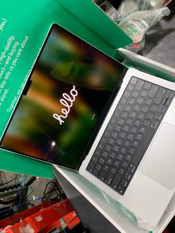 Photo 1 of Apple Late 2021 MacBook Pro with Apple M1 Pro chip 8-core CPU (14-inch, 16GB RAM, 512GB SSD) Silver (Renewed Premium)