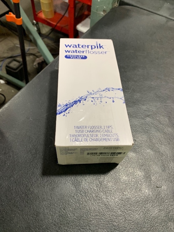 Photo 1 of Waterpik Cordless Pulse Rechargeable Portable Water Flosser for Teeth, Gums, Braces Care and Travel with 2 Flossing Tips, Waterproof, ADA Accepted, WF-20 White, Packaging May Vary