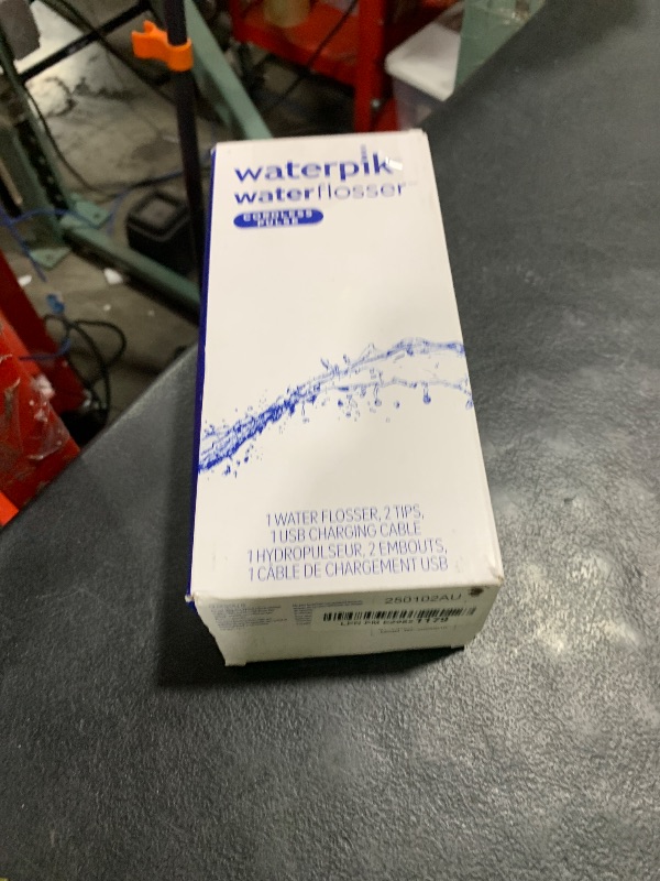 Photo 1 of Waterpik Cordless Pulse Rechargeable Portable Water Flosser for Teeth, Gums, Braces Care and Travel with 2 Flossing Tips, Waterproof, ADA Accepted, WF-20 White, Packaging May Vary
