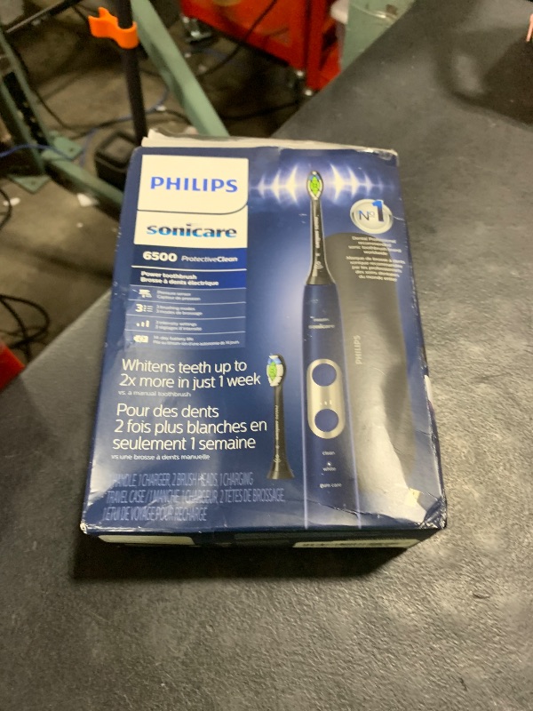 Photo 1 of Philips Sonicare ProtectiveClean 6500 Rechargeable Electric Toothbrush, with Pressure Sensor, 3 Cleaning Modes, SmarTimer and QuadPacer, 14-Day Battery Life, Charging Travel Case, Navy Blue, HX6462/07
