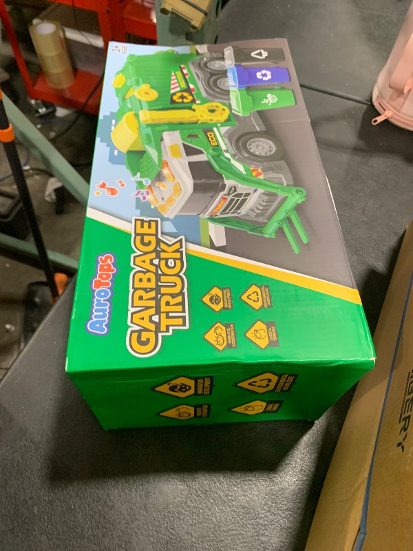 Photo 1 of AuroTops Garbage Truck Toys for Kids 3 4 5 6 7 8 Years Old Boys Toy Trucks Set with Sound and Light,Toddlers Birthday Gifts for Boys & Girls Learning Toys,Includes 3 Trash Bins with Trash Cards