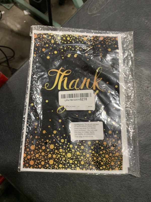 Photo 1 of Pajean 100 Pcs Thank You Gift Bags Bulk Black and Gold Plastic Bags with Handles Black Goodie Treat Shopping Wrap for Birthday Party Favors Small Business Merchandise Graduation, 6.7" x 9.8"