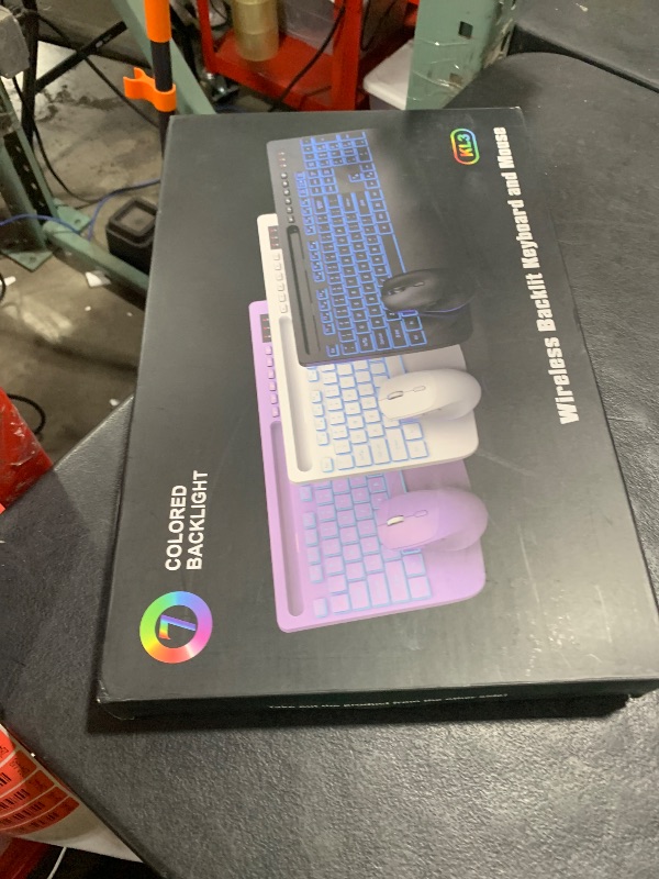 Photo 1 of Wireless Keyboard and Mouse Combo- 7-Color Backlit, Wrist Rest, Rechargeable, Silent Light-Up Keys, RGB Mouse, Ergonomic Full Size Keyboard with Phone Holder for Windows, Mac, PC, Laptop - Trueque