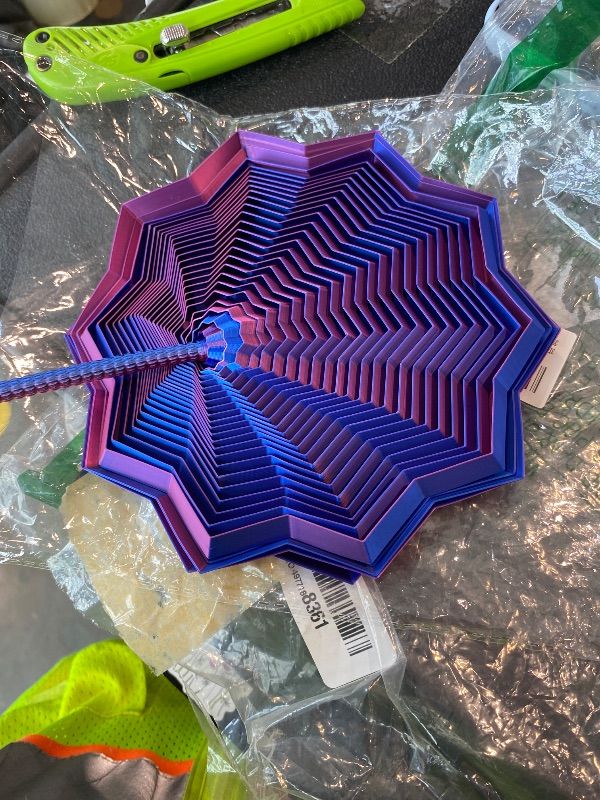 Photo 1 of *MINOR DAMAGE - USED*
3D Printed Expanded Sensory Fidget Star, Sensory Fidget Star with Handle, Colorful Whirling Spiral Design, Fractal Fidget Hexagon for Office desks as a Stress-Relief Gifts(Purple)