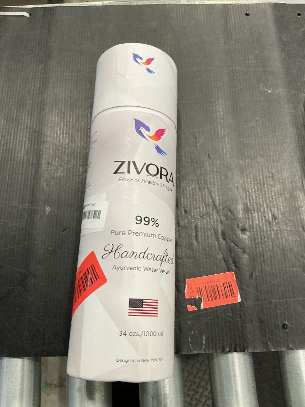 Photo 1 of **UNTESTED**
ZIVORA Copper Water Bottle - 34oz Pure Water Bottle for Drinking with Dual Cap, Copper Straw, Canvas Bag & Cleaning Brush - Handcrafted, Lab-Tested, Specially Design for Outdoor Activities