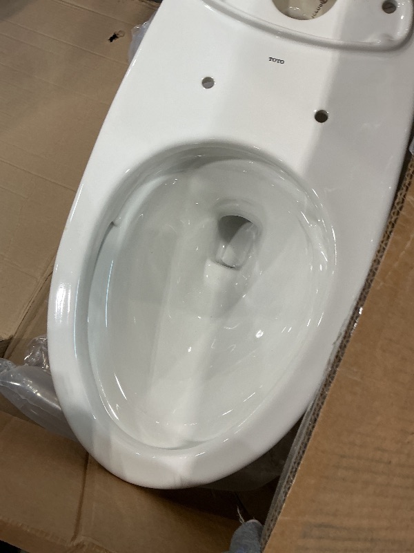 Photo 1 of *MISSING PARTS - See Clerk Notes*
TOTO Drake 1.6 GPF TORNADO FLUSH Toilet with CEFIONTECT, Cotton White - CST776CSG#01