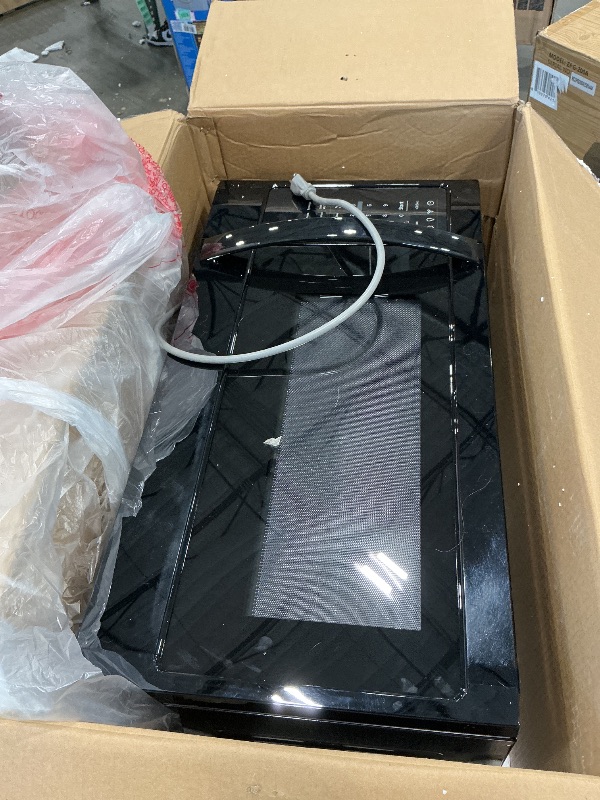 Photo 1 of *MAJOR DAMAGE*
BLACK+DECKER Over the Range Microwave Oven with Vent and One-Touch Auto Cooking, 1.7 cu. ft. OTR Over Stove Microwave, Black, 1000 Watts, EM044K6CF-BK