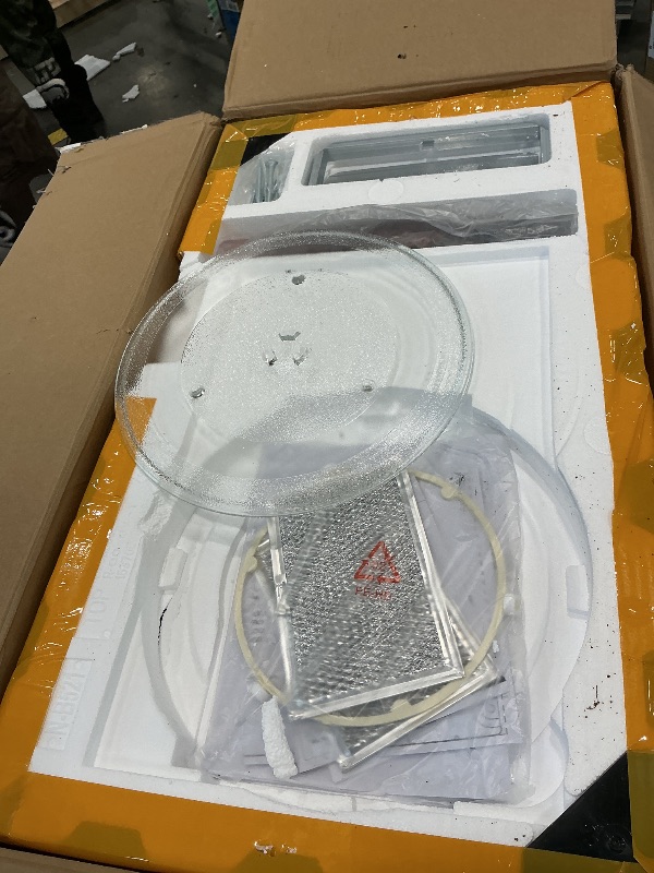 Photo 1 of *MAJOR DAMAGE*
BLACK+DECKER Over the Range Microwave Oven with Vent and One-Touch Auto Cooking, 1.7 cu. ft. OTR Over Stove Microwave, Black, 1000 Watts, EM044K6CF-BK