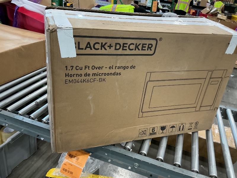 Photo 1 of *MAJOR DAMAGE*
BLACK+DECKER Over the Range Microwave Oven with Vent and One-Touch Auto Cooking, 1.7 cu. ft. OTR Over Stove Microwave, Black, 1000 Watts, EM044K6CF-BK