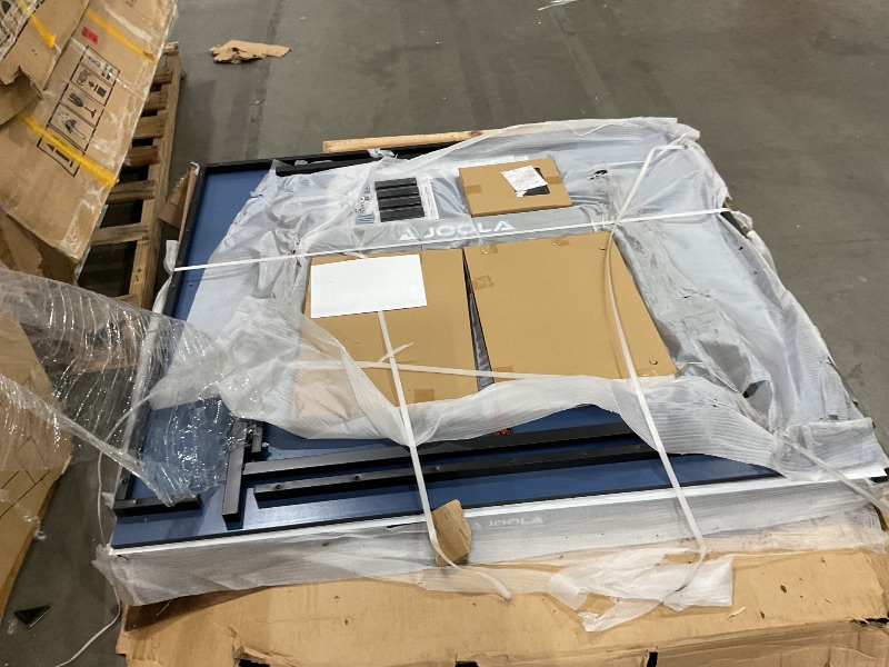 Photo 1 of [box was destroyed ] JOOLA NOVA DX Indoor/Outdoor Table Tennis Table with Weatherproof Net Set OVERSIZE ITEM NEED PALLET JACK AND LARGE TRUCK