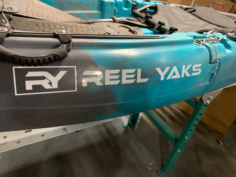 Photo 1 of *****DIRTY******Reel Yaks Raptor Modular Fishing Kayak - 9.5ft Lightweight Fin Drive, Sit On Top Kayak for Adults & Youth - Stable & Portable, Ideal Space-Saving Design for Travel - 380lbs Capacity - Cyan Gray