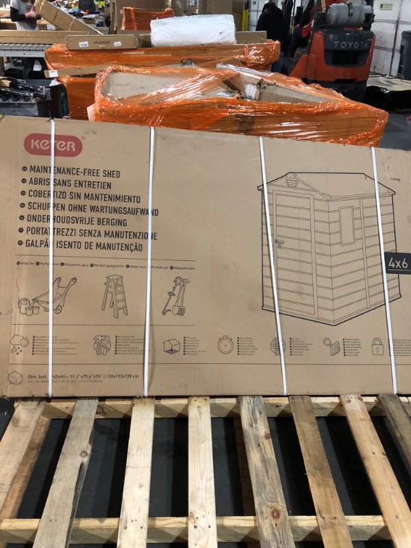 Photo 1 of Keter Manor 4x6 Resin Outdoor Storage Shed Kit-Perfect to Store Patio Furniture, Garden Tools Bike Accessories, Beach Chairs and Lawn Mower, Grey & White