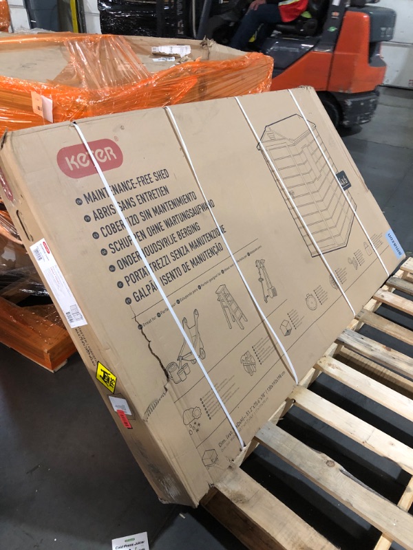 Photo 1 of Keter Manor 4x6 Resin Outdoor Storage Shed Kit-Perfect to Store Patio Furniture, Garden Tools Bike Accessories, Beach Chairs and Lawn Mower, Grey & White