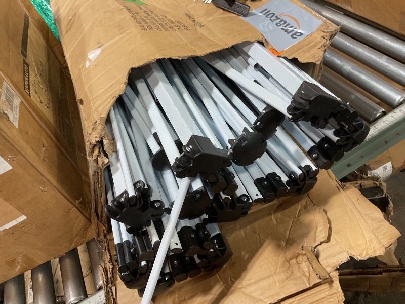 Photo 1 of *parts broken*10x30 Pop Up Canopy - Heavy Duty Outdoor Canopy Tent with Portable Roller Bag - 3 Adjustable Height, 4 Weight Bags, 8 Stakes & 6 Guy Ropes Included, White