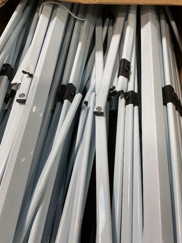 Photo 1 of *parts broken*10x30 Pop Up Canopy - Heavy Duty Outdoor Canopy Tent with Portable Roller Bag - 3 Adjustable Height, 4 Weight Bags, 8 Stakes & 6 Guy Ropes Included, White