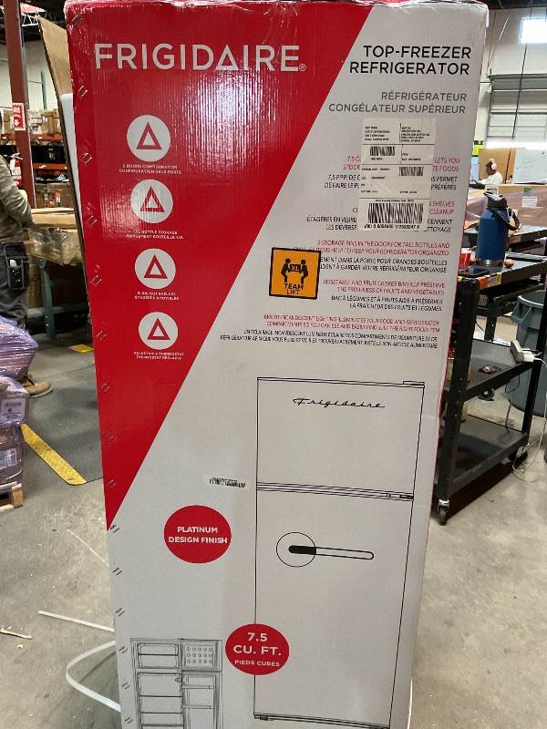 Photo 1 of **MAJOR DAMAGE TO LEFT SIDE POSSIBLY FOR PARTS/ UNTESTED** Frigidaire Retro Apartment Size Refrigerator with Top Freezer - 2 Door Fridge with 7.5 Cu Ft of Storage Capacity, Adjustable Spill-Proof Shelves, Door & Crisper Bins, Azure