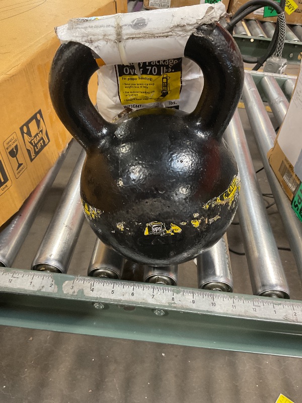 Photo 1 of **SURFACE CHIPS FROM TRANSPORT**CAP Barbell Black Powder Coated Cast Iron Kettlebell, 70 lb