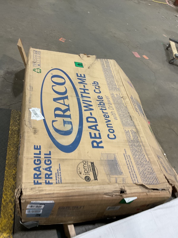 Photo 1 of ***FOR PARTS ONLY/ HAS DAMAGES*** Graco Read-with-Me 4-in-1 Convertible Crib with Drawer (Hazelnut) - GREENGUARD Gold Certified Converts to Toddler Bed, Daybed, and Functional Bookshelves