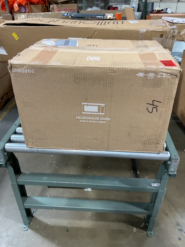 Photo 1 of ***DOOR LATCH IS BROKEN*** SAMSUNG 1.9 cu. ft. Countertop Microwave with Sensor Cooking, Matte Black Stainless Steel, MS19DG8500MTAA