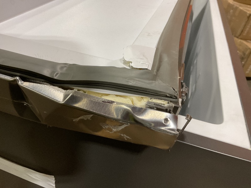 Photo 1 of ****MAJOR DAMAGE FOR PARTS OR SCRAP****BLACK+DECKER 24 Cu. Ft. Top Mount Refrigerator with Ice Maker, 2-Door Refrigerator with Top Freezer, Freezer with Icemaker and Adjustable Temperature Control, ENERGY STAR, BR2400JIMS, Stainless Look