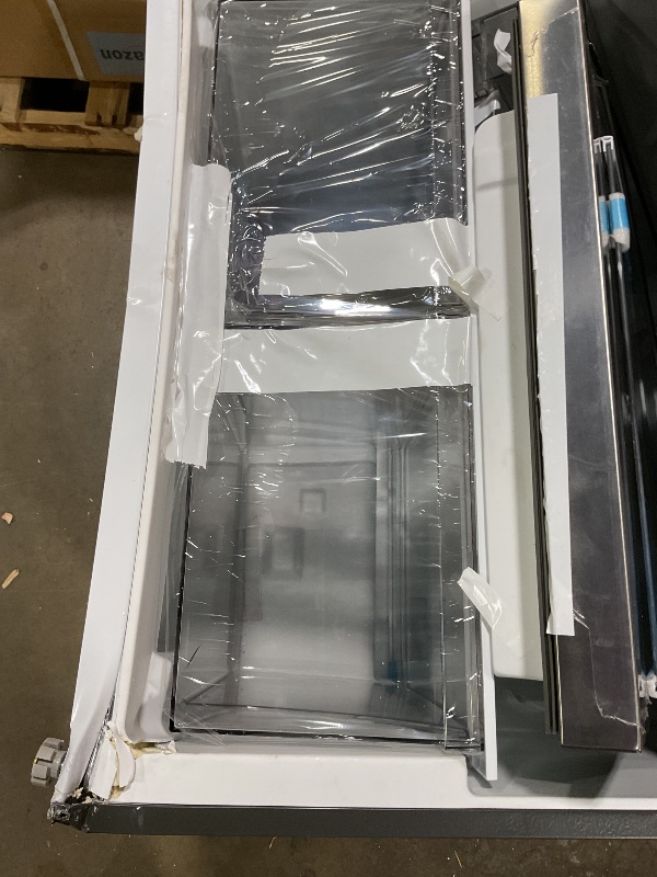 Photo 1 of ****MAJOR DAMAGE FOR PARTS OR SCRAP****BLACK+DECKER 24 Cu. Ft. Top Mount Refrigerator with Ice Maker, 2-Door Refrigerator with Top Freezer, Freezer with Icemaker and Adjustable Temperature Control, ENERGY STAR, BR2400JIMS, Stainless Look